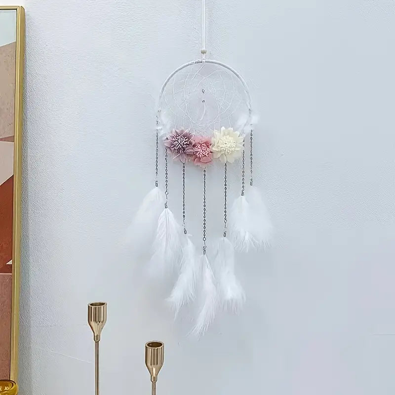 Atrapasueños con plumas y flores