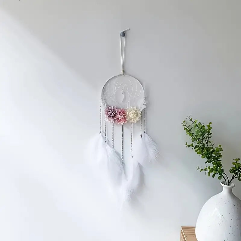 Atrapasueños con plumas y flores