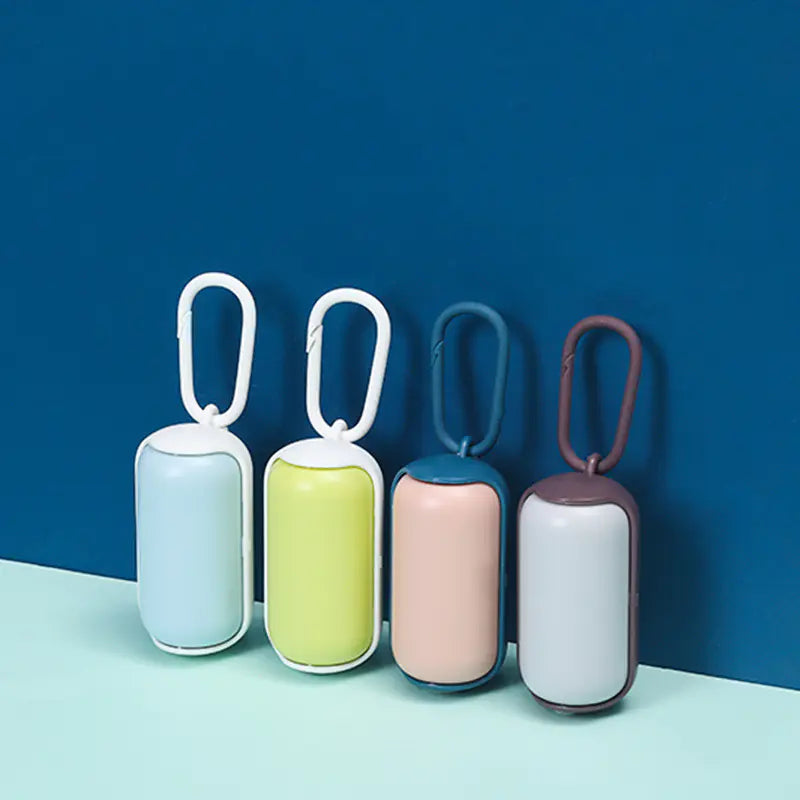 Dispensador de bolsas portátil para mascotas