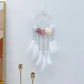 Atrapasueños con plumas y flores